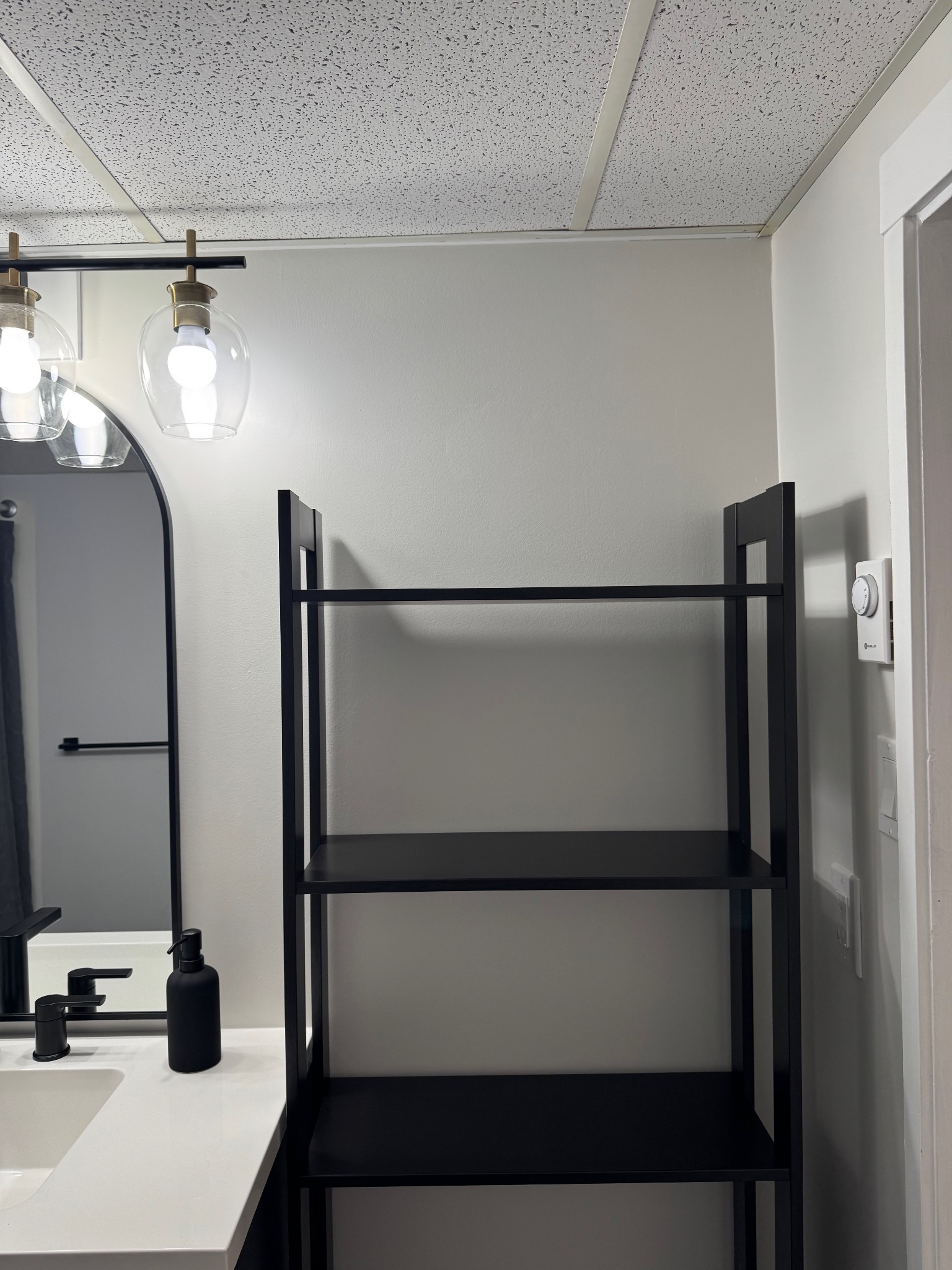 Bathroom shelving in the Lower Suite