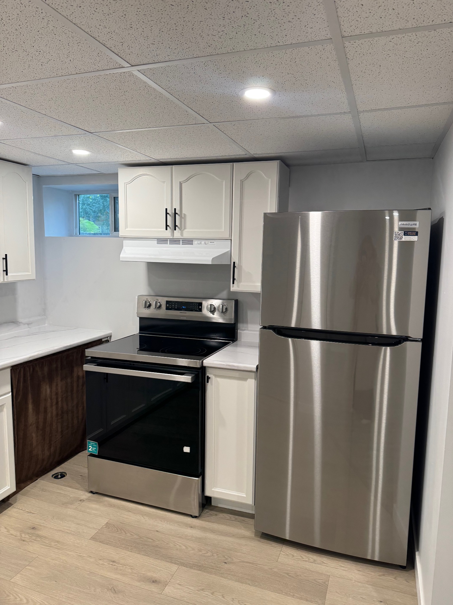 Appliances and cabinetry in the Lower Suite kitchen